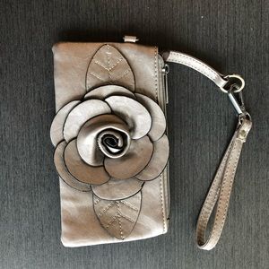 New silver flower clutch.